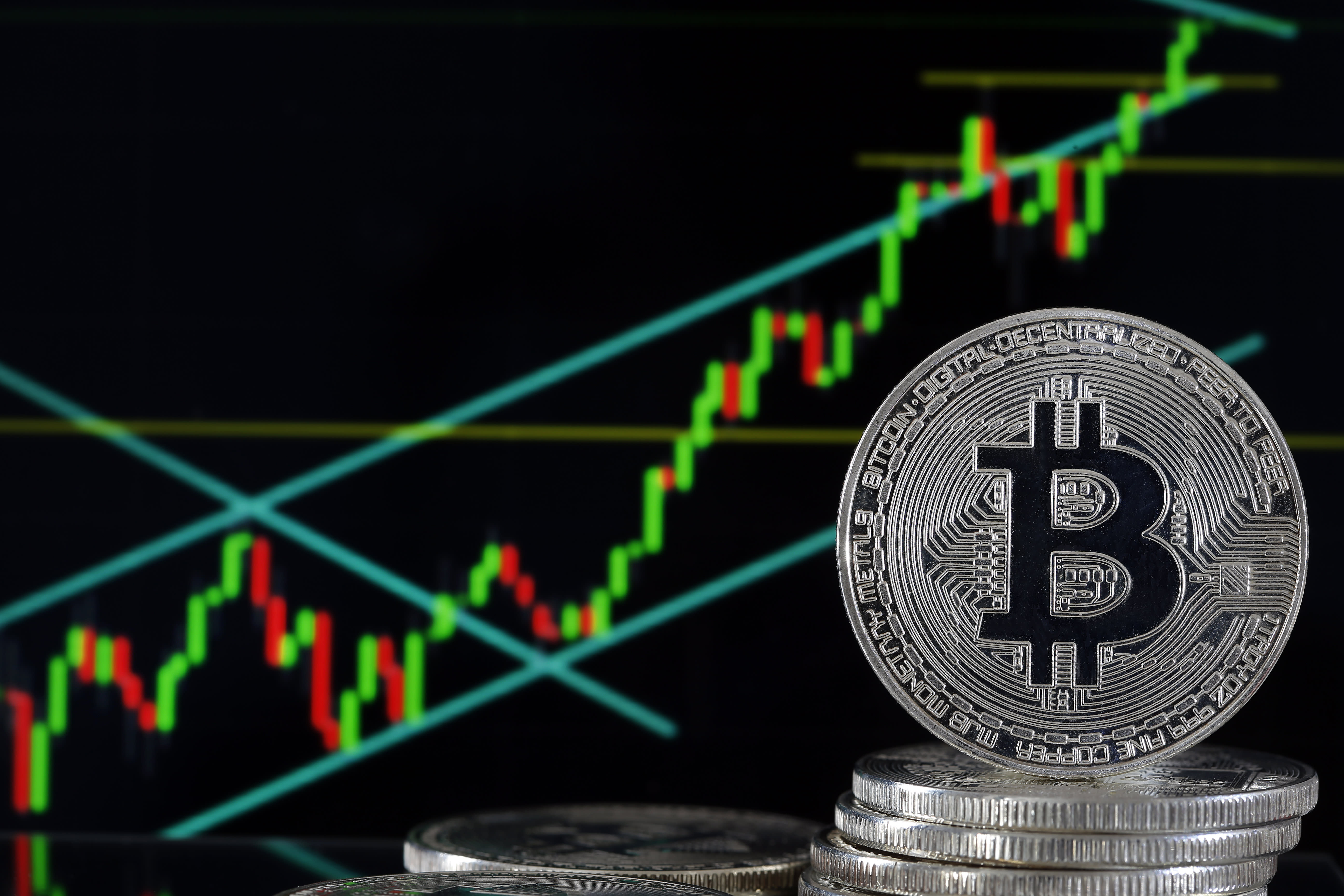 Bubble or brave new world? Bitcoin breaks USD 10, barrier