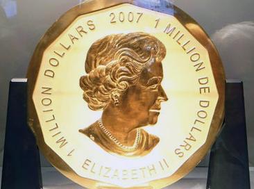 Royal Mint unveils giant £10, gold coin | UK news | The Guardian