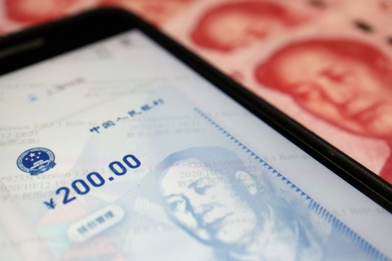 China central bank launches digital yuan wallet apps for Android, iOS | Reuters