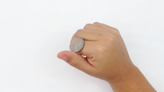 How to Roll a Coin on Your Fingers |